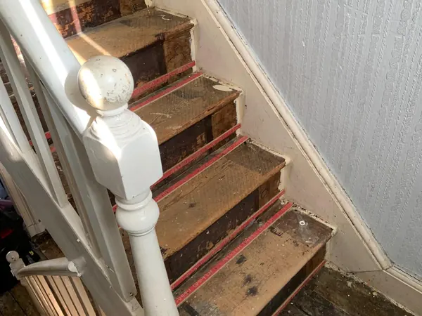 The same house emptied room by room