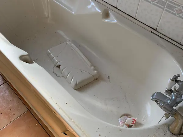 The same house emptied room by room