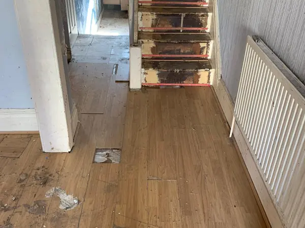 The same house emptied room by room
