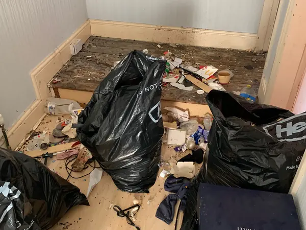 Cluttered house before clearance
