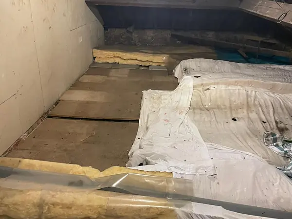 The same rooms emptied and the carpets swept
