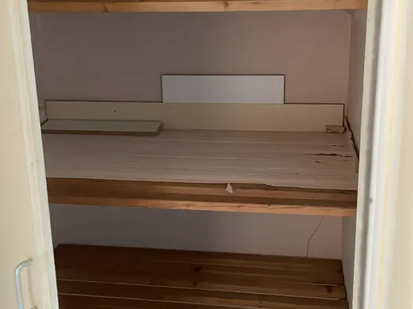 The same flat emptied and swept