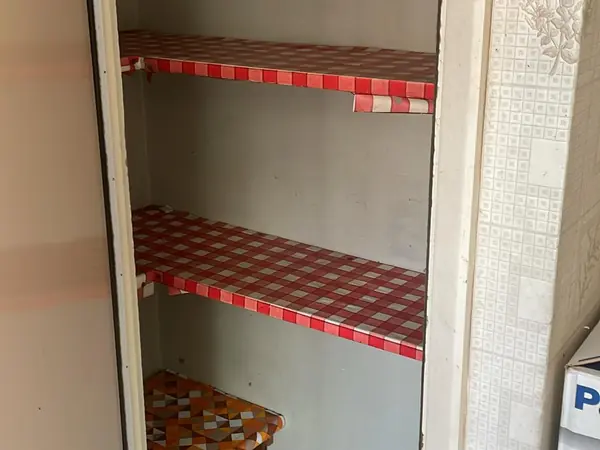 The same flat emptied and swept