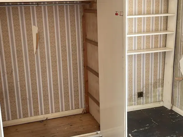 The same flat emptied and swept