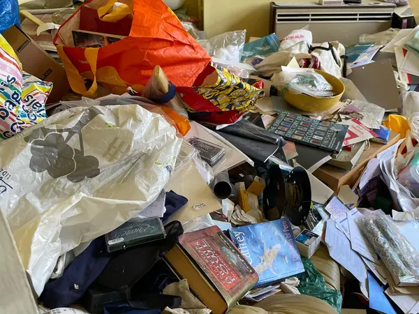 Cottage packed with bags and boxes before clearance